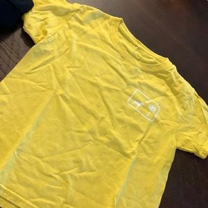 A yellow boys palmetto moon shirt